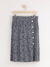 Blomstret nederdel med knapper