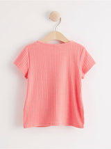 Pink ribbed top med knude