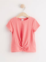 Pink ribbed top med knude