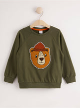 Mørke grøn sweatshirt med bjørn
