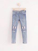 Slim fit jeans med kaniner