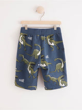 Shorts med dinosaurus