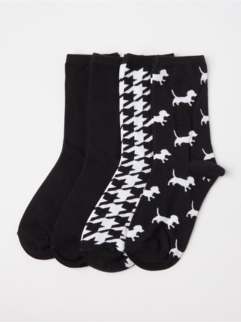 4-pack sokker med sort/hvid mønster