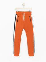 Orange sweatpants med sidestriber