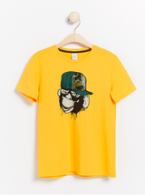 T-shirt med abe print og hologram effekt