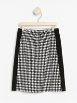Houndstooth-mønstret jersey nederdel med striber på siderne