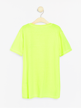 Neongul t-shirt med kraniemotiv