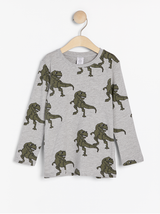Langærmet bluse med dinosaur print