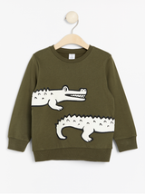 Mørke grøn sweatshirt med krokodille puff print
