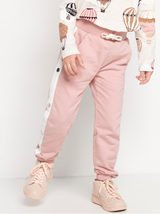 Lyserøde sweatpants med hvide side striber og metal knapper